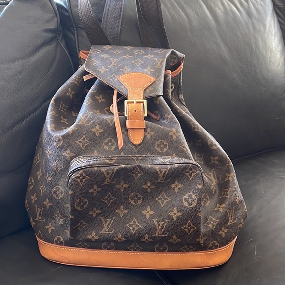 Louis Vuitton Handbags - Louis Vuitton full-size backpack in MINT condition.  Hardly ever used.